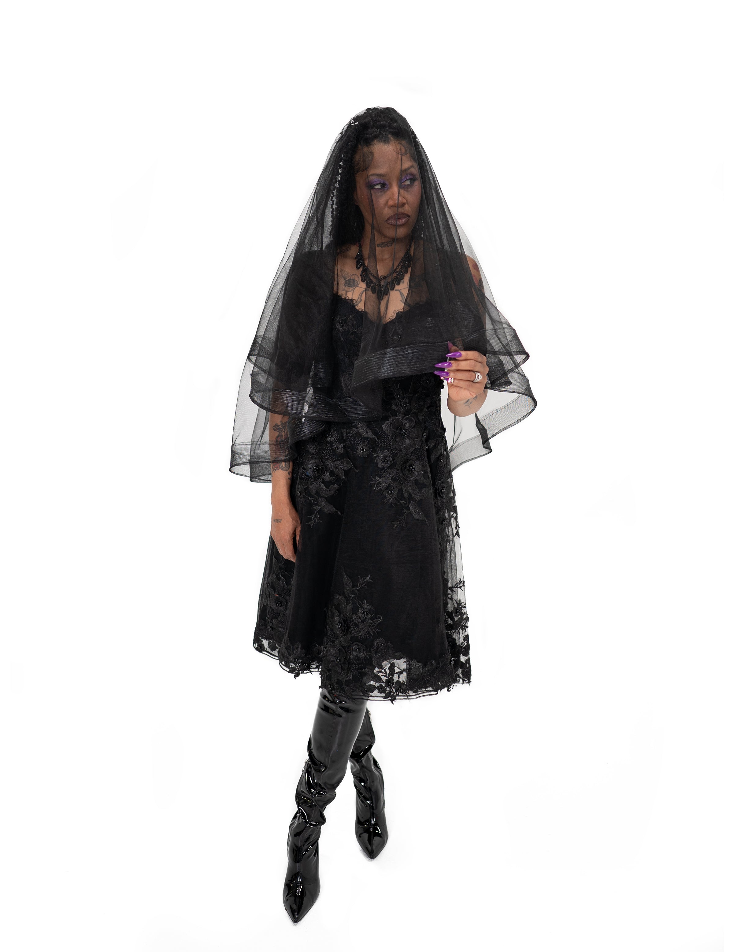 Black Altar Veil by Bête Noire over a gothic bridal look with soft tulle layers