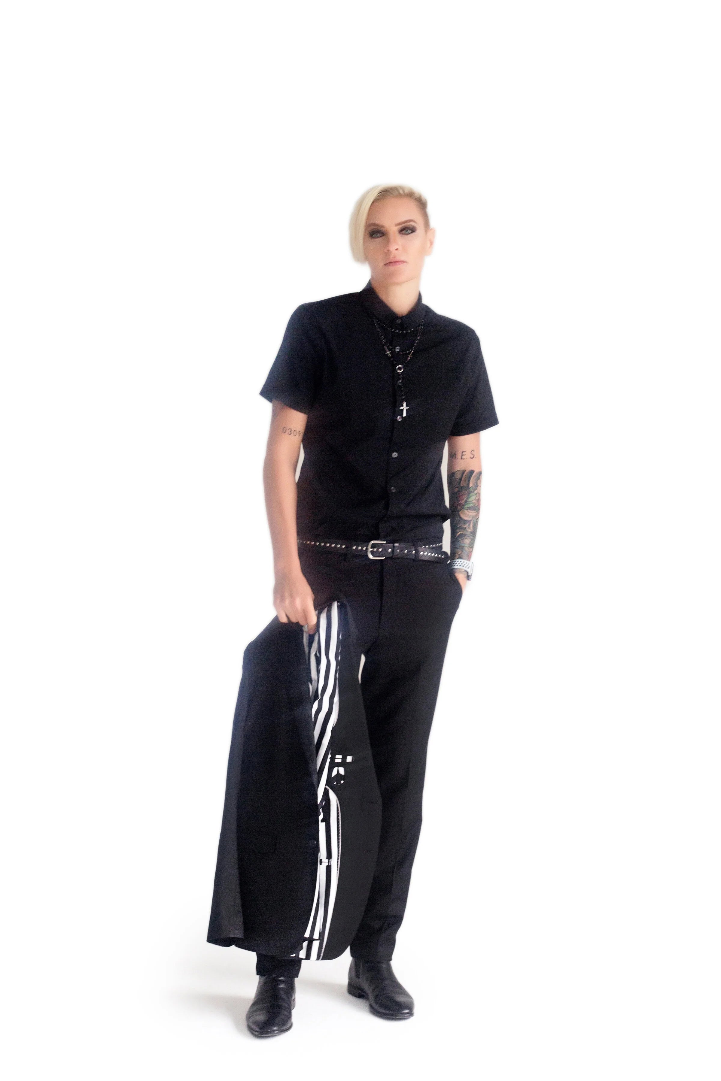 Recherché custom tailored suit styled with alternative menswear look
