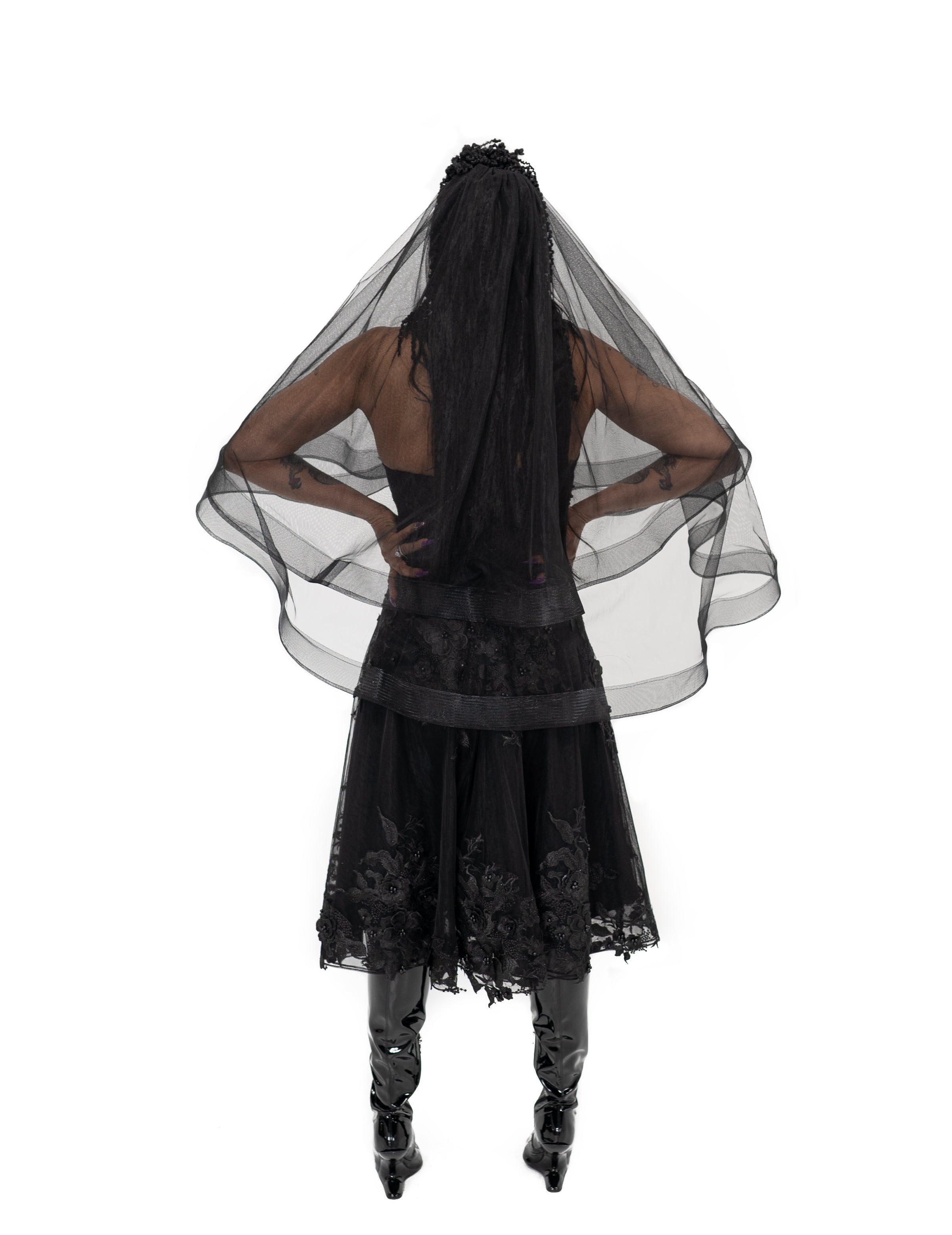 Back view of black gothic wedding veil with long soft tulle layers