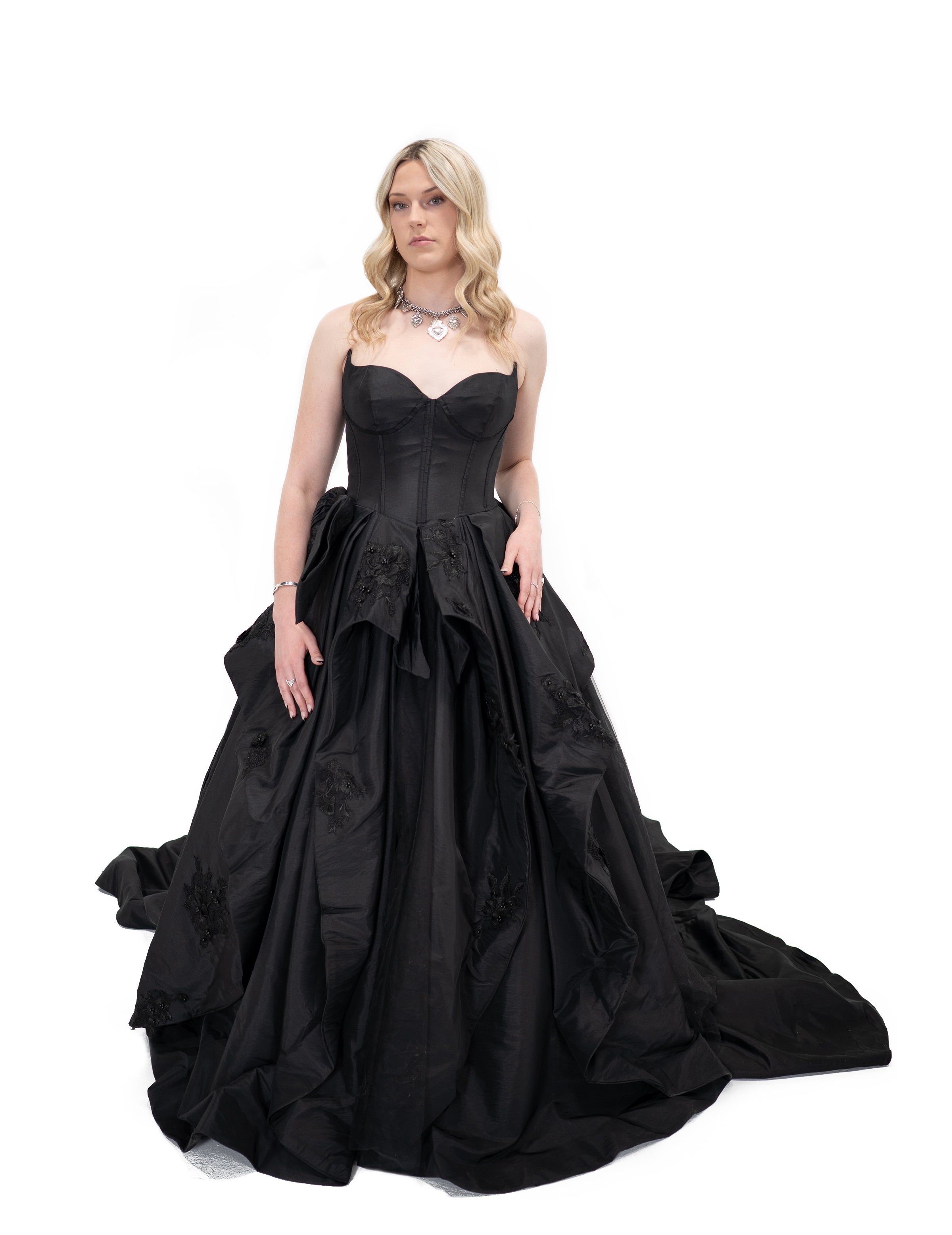 Black strapless gothic ballgown with structured corset bodice and full skirt by Bête Noire, front view