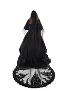 Full length black chapel veil on alternative bride by Bête Noire