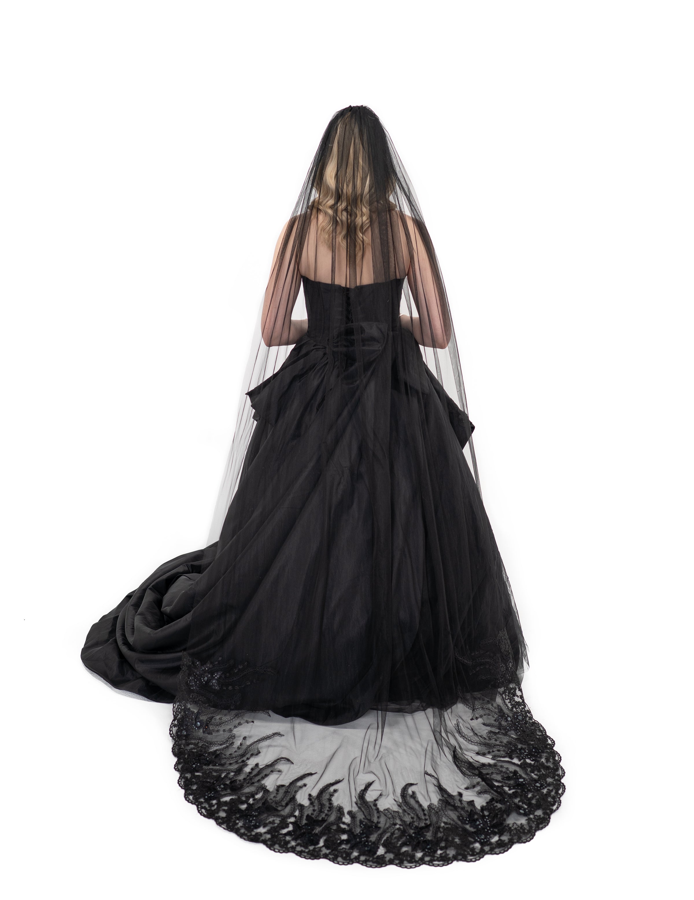 Gothic bridal veil in black tulle with lace trim, shown from the back with full length and volume