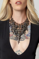 Close up of skull and cross details on Adonia statement necklace