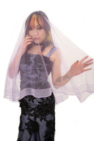 Sheer purple altar veil by Bête Noire close up front view with soft layered tulle