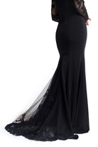 Black gothic gown with fitted bodice and flowing train
