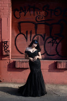 Black mermaid silhouette evening gown by Bête Noire