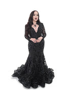 Black gothic wedding gown by Bête Noire with plunging neckline and fitted mermaid silhouette, front view