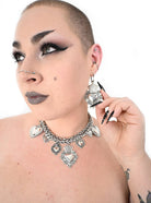 Divine Flame earrings styled with alternative gothic outfit