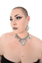 Divine Flame necklace styled with alternative gothic outfit