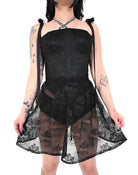 Close up of sacred heart couture lace on Eternal Flame mini skirt