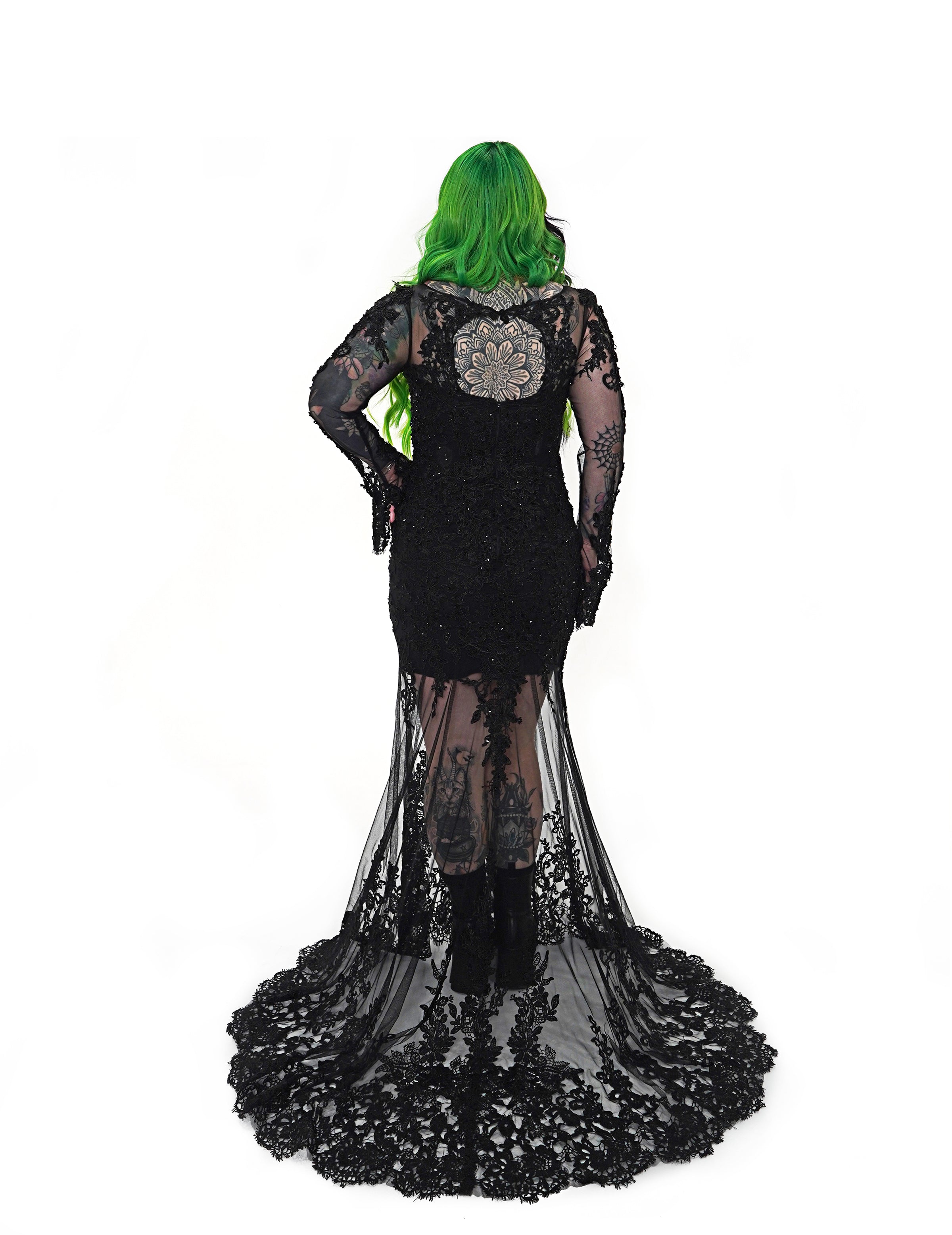 Back view of the Kayla dress by Bête Noire with sheer lace back panel and dramatic lace train