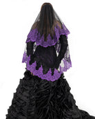 Back detail of Oath veil by Bête Noire with scalloped dark purple lace trim on black tulle
