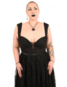 Close up of sacred heart couture lace on Purgatory dress