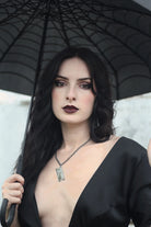 Relentless Razor necklace styled with alternative gothic outfit