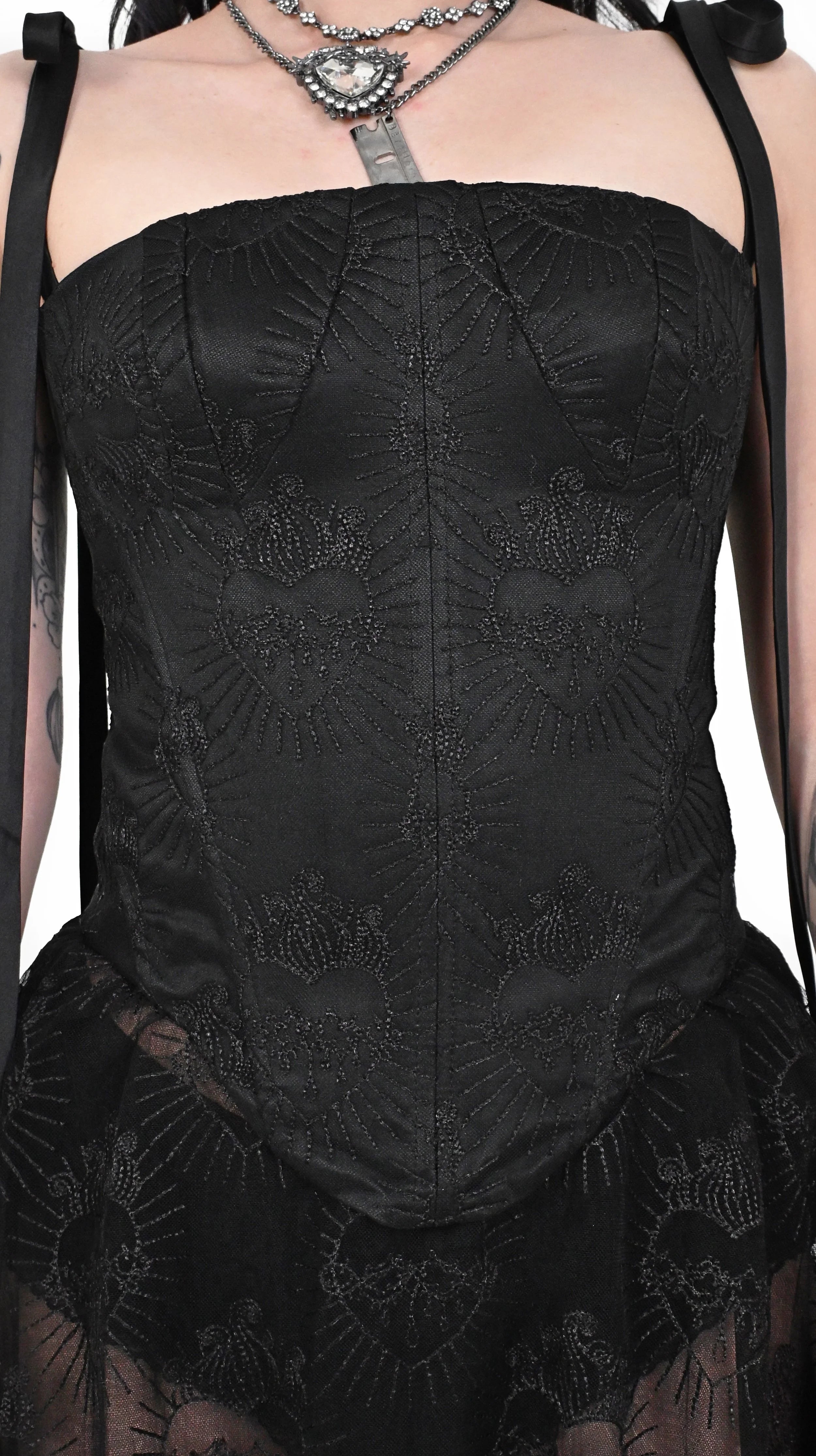 Close up of sacred heart couture lace on Sacrament corset