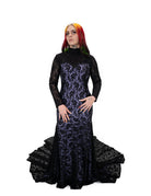 Evangeline gown by Bête Noire, black lace gown with purple underlay, high neck and long sleeves, fitted silhouette with lace train