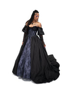 Alternative bridal Ophelia gown in black with purple lace under layer and off shoulder sleeves by Bête Noire