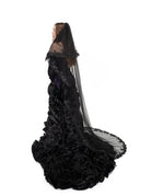 Side view of the Raven Veil by Bête Noire, a black two-tier gothic bridal veil with lace edging