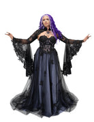 Close view of the violet dress bodice with black lace appliqué over a sheer corset, paired with a lace bolero featuring flared bell sleeves.